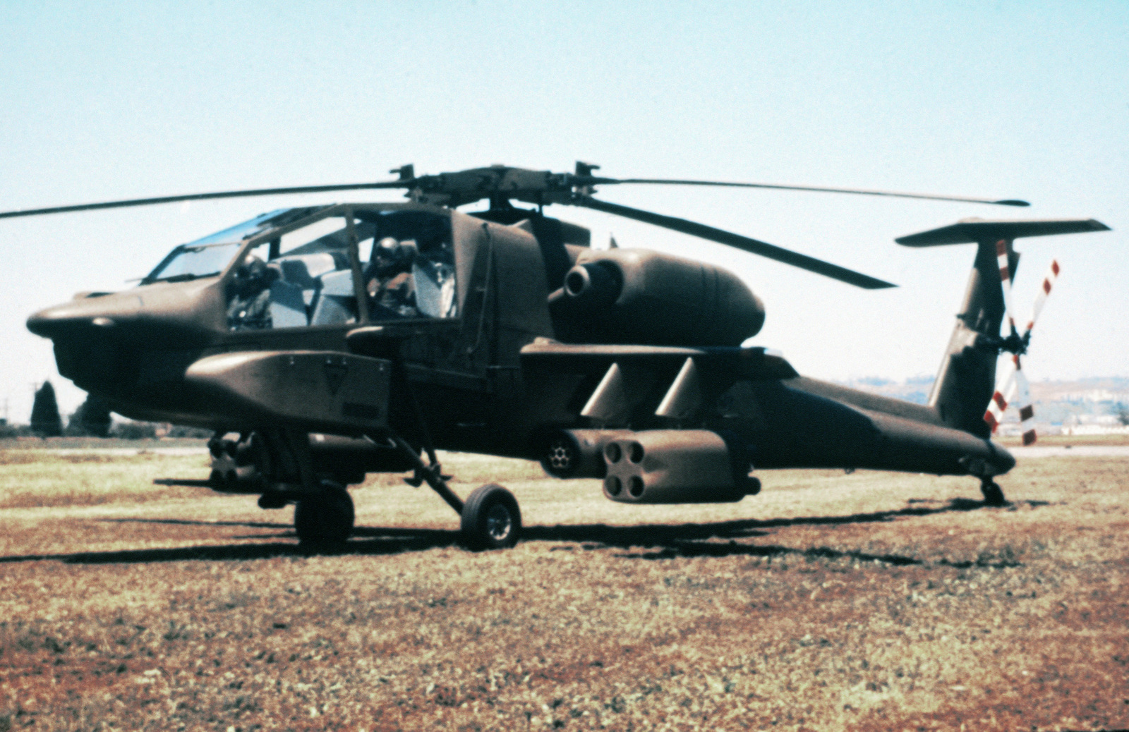 a-left-side-view-of-a-prototype-of-the-ah-64-apache-helicopter-substandard-1557c7-1600.jpg