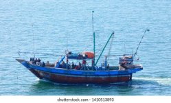 pakistani-fishing-boat-sailing-open-260nw-1410513893.jpg