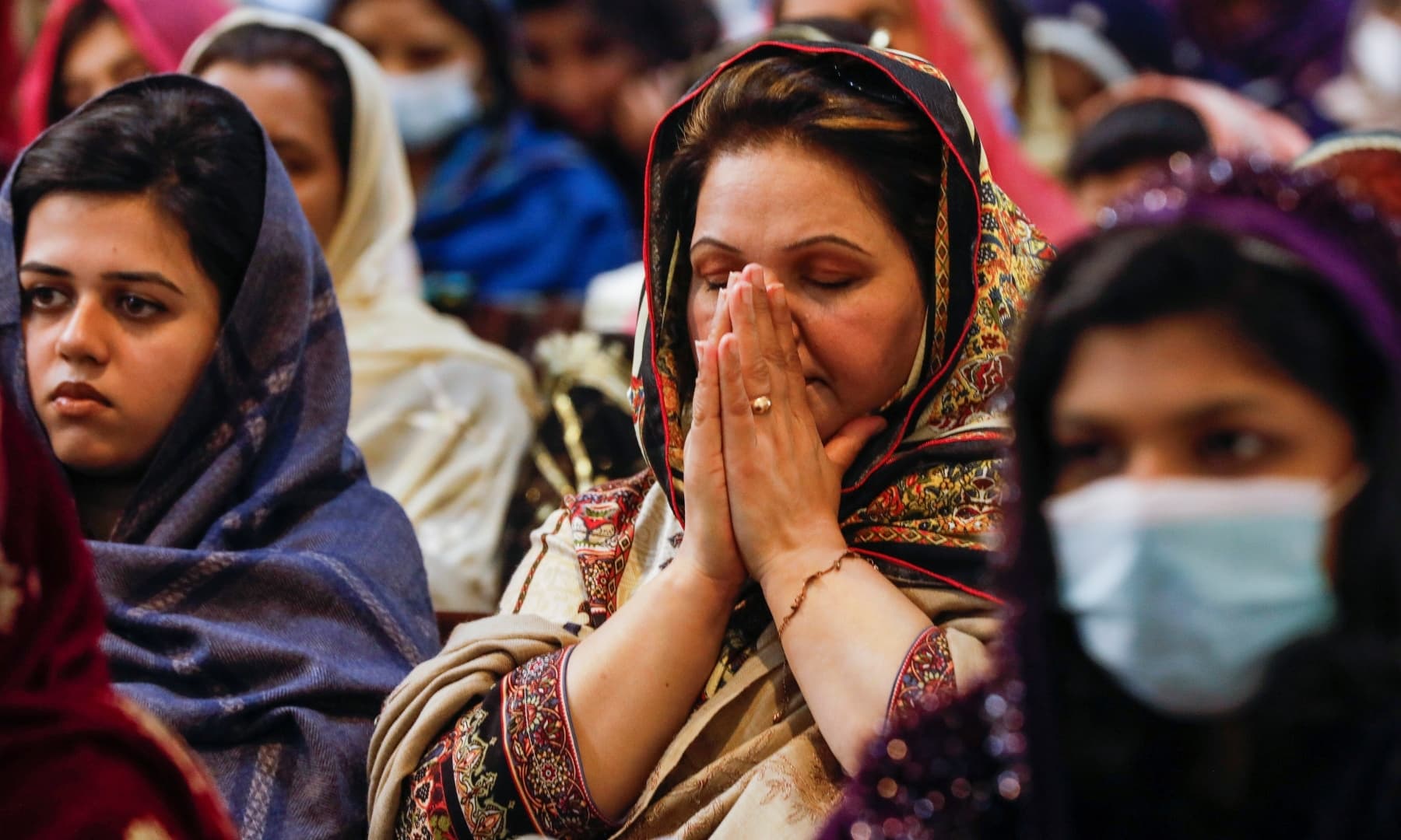 People attend a Christmas service at St. John's Cathedral in Peshawar, December 25. — Reuters