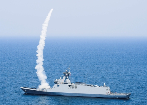 The Chuncheon FFG-II frigate launches Haegung surface-to-air missiles to shoot down an aerial target during live-fire drills held in the East Sea on May 10, 2024, in this photo provided by the Navy. (PHOTO NOT FOR SALE) (Yonhap)