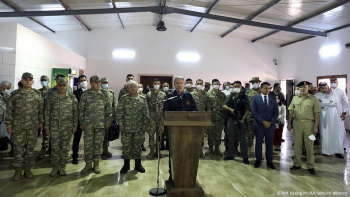 Turkish soldiers stand at attention in Libya