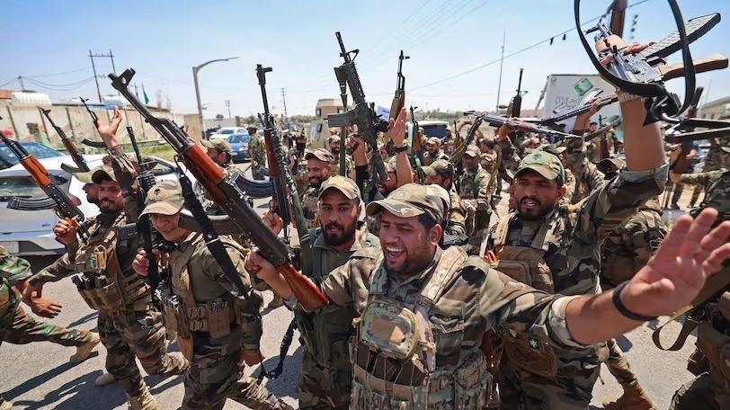Iraq sets September deadline for integration of armed groups