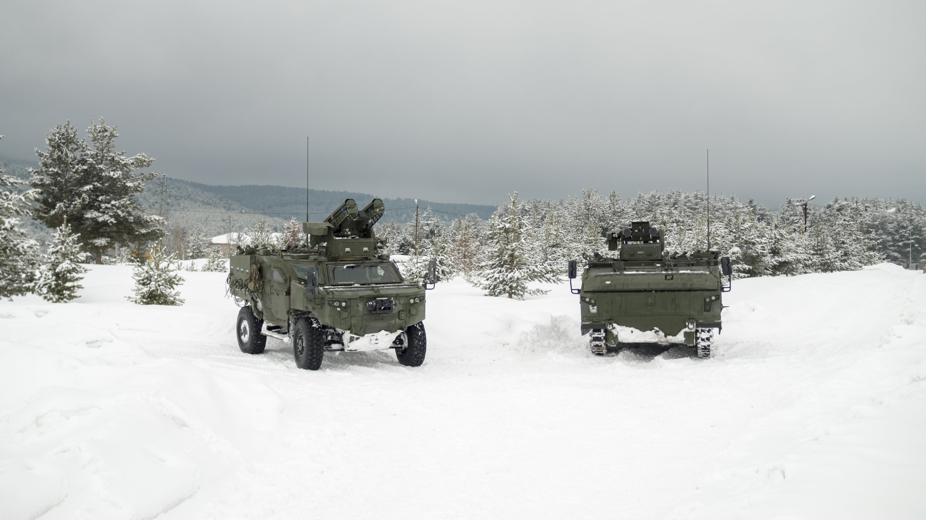 Kaplan (R) and Pars (L) 4x4 weapon carrier vehicles seen in this photo provided on Aug. 21, 2021. (Courtesy of FNSS)