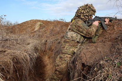 A Ukrainian soldier from the 93rd Mechanized Brigade protects his position on the Chasiv Yar front, February 18.