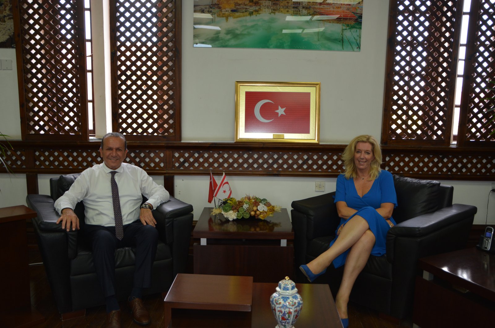 Turkish Cyprus' Tourism Minister Fikri Ataoğlu (L) meets with Dutch lawmaker Liane den Haan in Lefkoşa (Nicosia), TRNC, Aug. 16, 2021. (AA Photo)