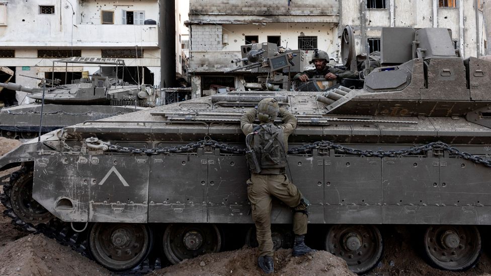 Israeli soldiers operate amid the ongoing ground invasion against Palestinian Islamist group Hamas in the northern Gaza Strip, on 8 November 2023
