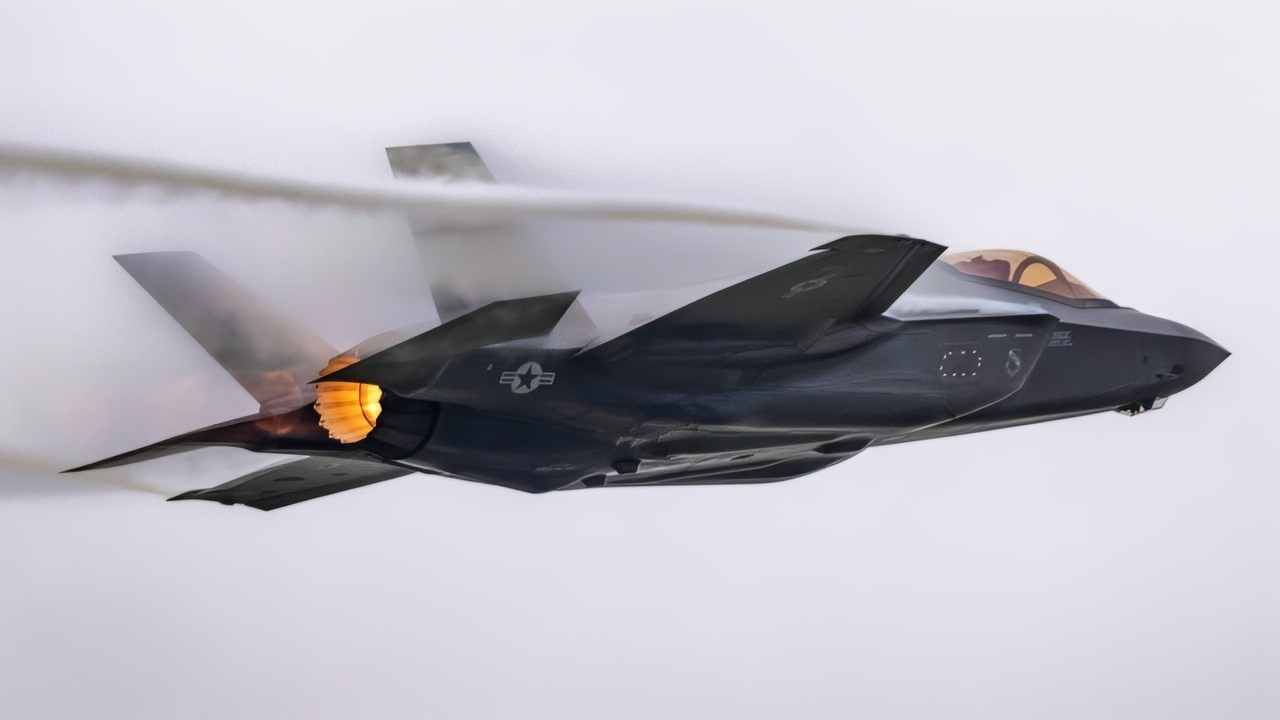 U.S. Air Force Maj. Kristin BEO Wolfe, F-35A Lightning II Demonstration Team pilot and commander, performs for F-135 engine maintainers assigned to the Oklahoma City Air Logistics Complex, at Tinker Air Force Base, Okla., May 25, 2021. The F-35A Demonstration Team put on the performance for the maintainers as a show of appreciation for keeping F-35s throughout the Department of Defense running and in the sky. (U.S. Air Force photo by Staff Sergeant Thomas Barley)