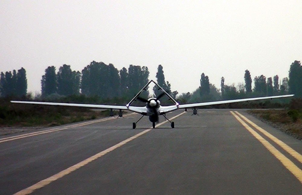 A Baykar Bayraktar TB2 UCAV waits on a runway during a military drill in Azerbaijan, March 17, 2021. (IHA Photo)