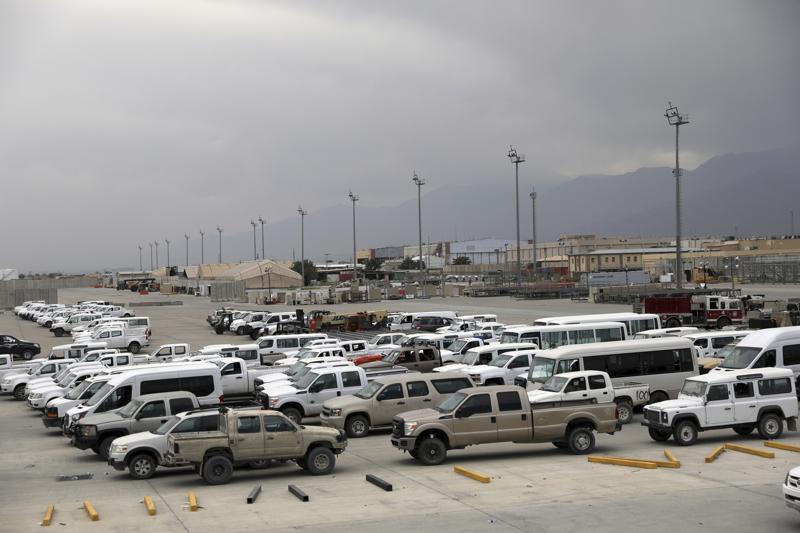 Vehicles are parked at Bagram Airfield after the American military left the base, in Parwan province north of Kabul, Afghanistan, Monday, July 5, 2021. The U.S. left Afghanistan's Bagram Airfield after nearly 20 years, winding up its forever war, in the night, without notifying the new Afghan commander until more than two hours after they slipped away. (AP Photo/Rahmat Gul)