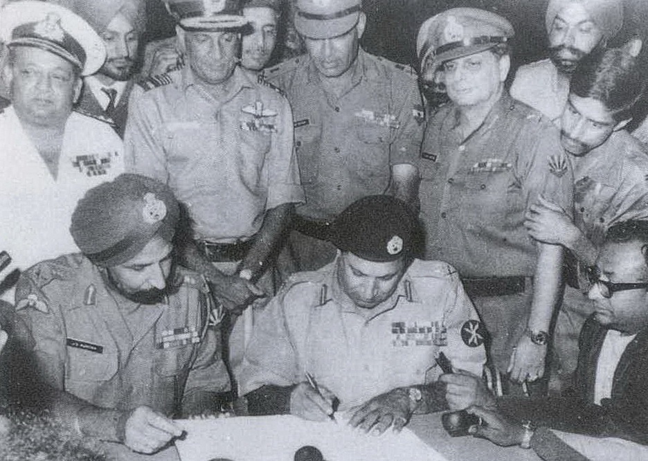 Lt Gen Amir Abdullah Khan Niazi signs the Instrument of Surrender under the gaze of Lt Gen Jagjit Singh Aurora in Dhaka on December 16, 1971. R&AW is said to have played a key role in the creation of Bangladesh