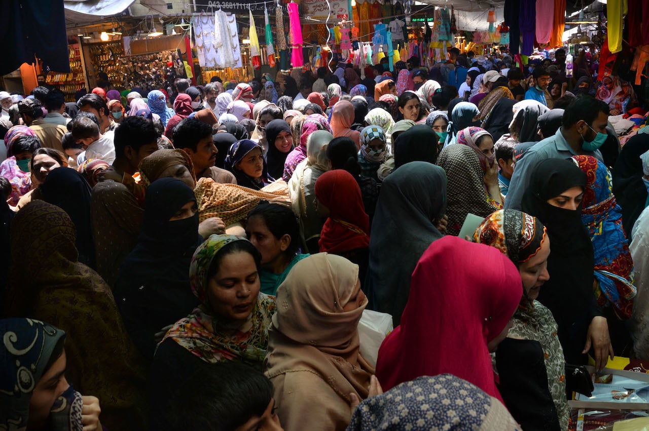 A market is full of shoppers ahead of Eid, most customers can be seen without masks and social distance is not being maintained | Arif Ali/White Star