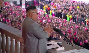 A screen grab taken from a KCNA broadcast shows the North Korean leader, Kim Jong-un, delivering a speech before the military parade.