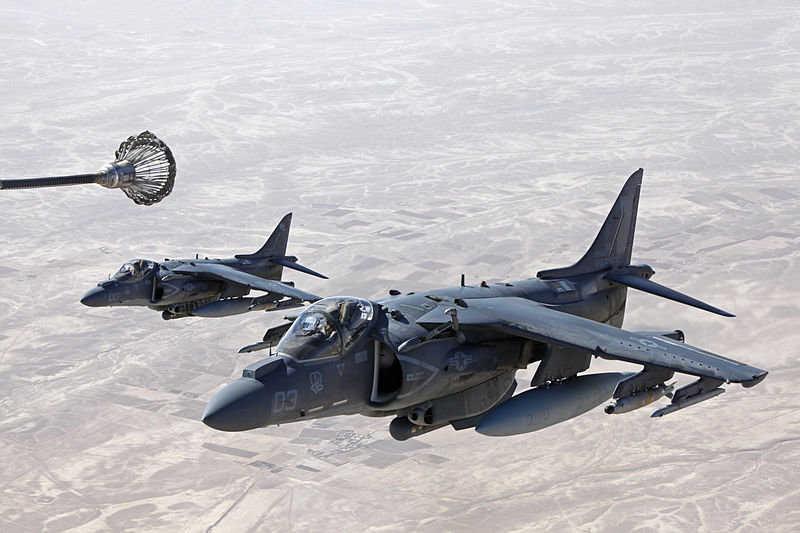 U.S.-Marine-Corps-AV-8B-Harrier-aircraft-attached-to-Marine-Attack-Squadron-VMA-311-are-refueled-by-a-KC-130J-Hercules-aircraft.jpg