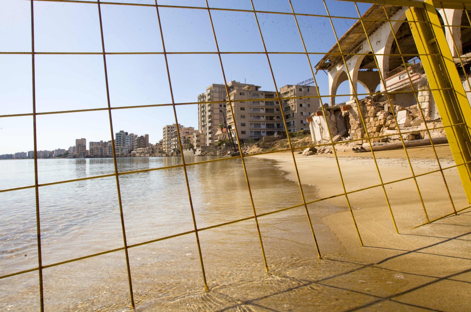 Derelict hotels, restaurants and residential buildings remain abandoned at the fenced-off beachfront eastern town of Varosha (Maraş), in Northern Cyprus, on Oct. 14, 2020. (AFP)