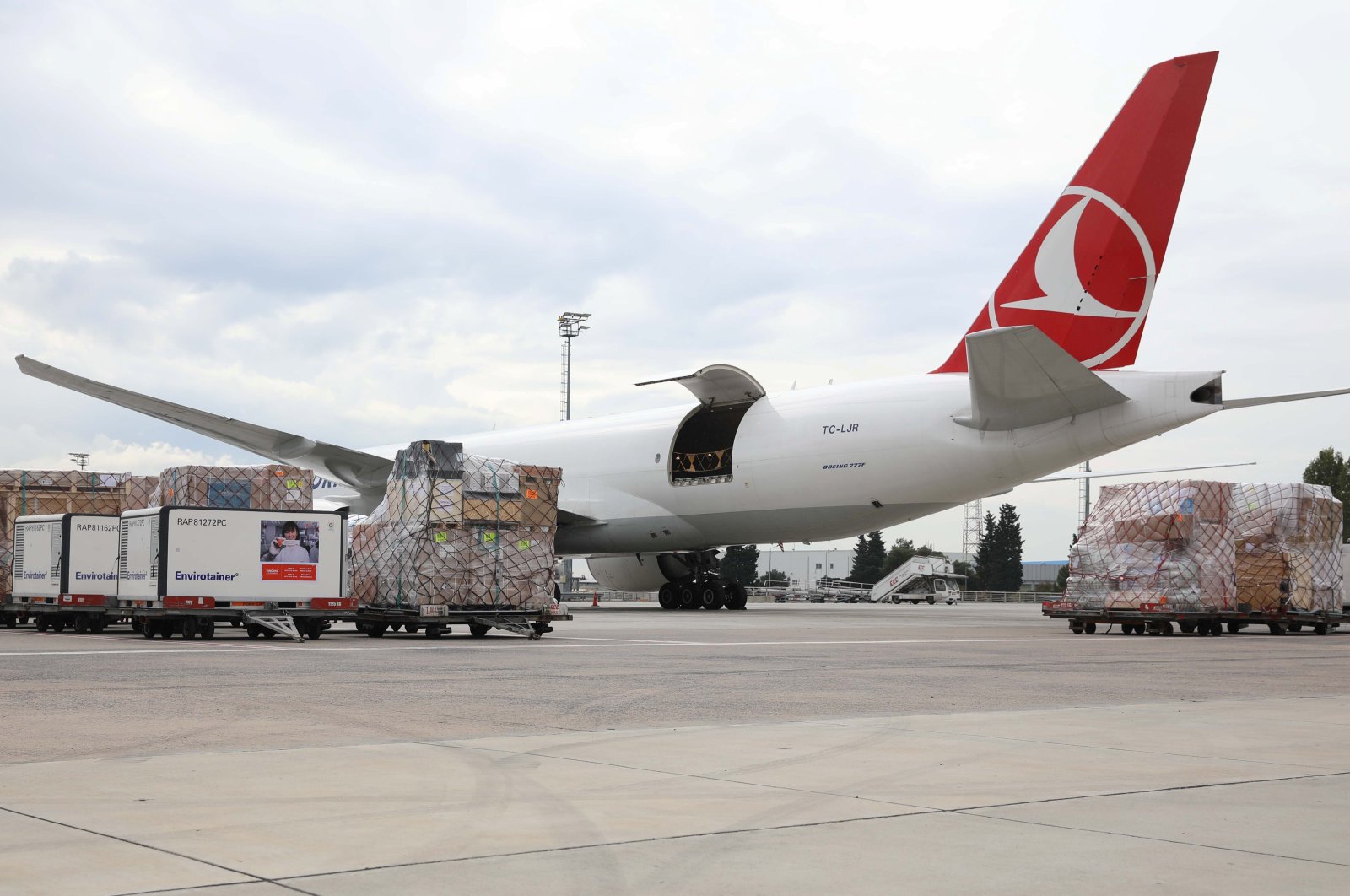 A Turkish Cargo plane is loaded with containers at Istanbul Airport, Istanbul, Turkey, Nov. 18, 2020. (Photo by Turkish Airlines via Reuters )