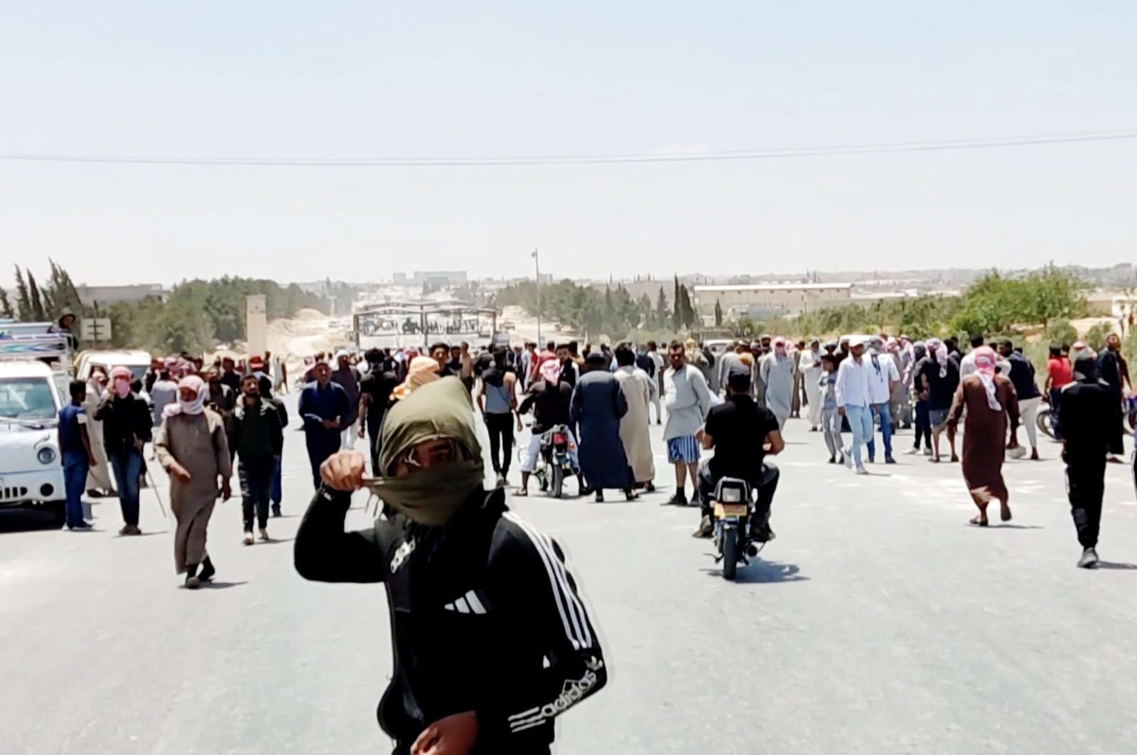 People protest YPG oppression in northern Syria's Manbij, June 1, 2021. (AA Photo)