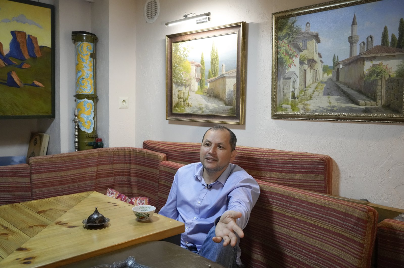 Erfan Kudusov talks during an interview with The Associated Press in Kyiv, Ukraine, Aug. 11, 2021. (AP Photo)