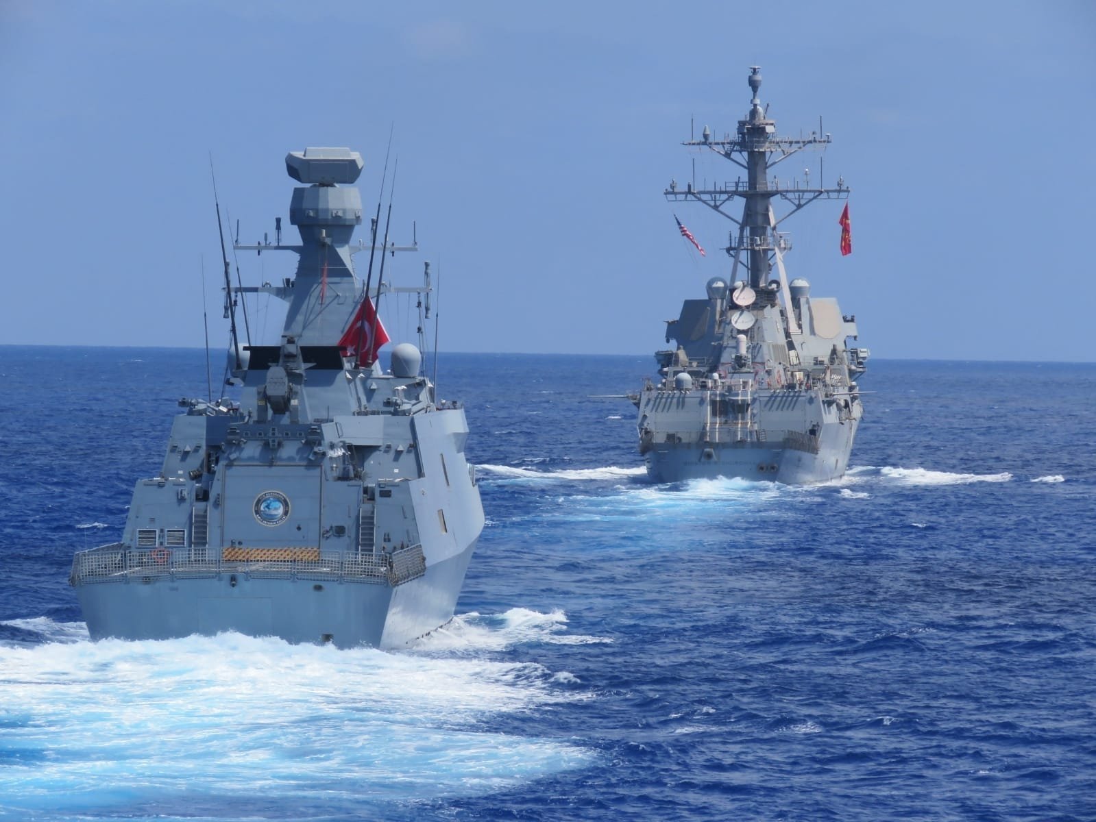 Turkish frigates TCG Barbaros and TCG Burgazada conducts maritime training with American destroyer USS Winston S. Churchill in the Eastern Mediterranean, Aug. 26, 2020. (DHA)