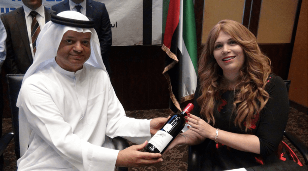 Tura Winery co-owner Vered Ben Sa’adon, right, attends a signing ceremony for a business deal in Dubai, December 7, 2020. Tura is based in the illegal West Bank settlement of Rechelim. (Photo: Tura Winery) Tura Winery co-owner Vered Ben Sa’adon, right, attends a signing ceremony for a business deal in Dubai, December 7, 2020. Tura is based in the illegal West Bank settlement of Rechelim. (Photo: Tura Winery)