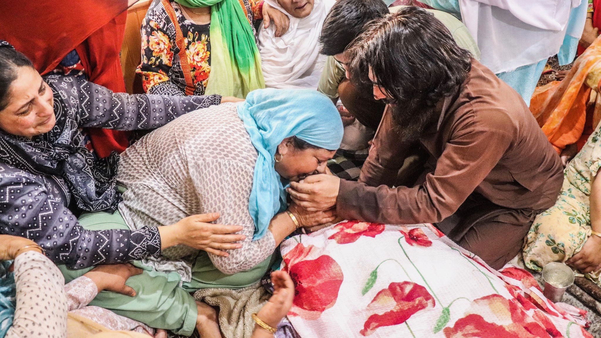 Family-members-mourns-the-killing-of-Bashir-Ahmad-Khan-after-he-body-was-brought-at-his-residence-in-Srinagar-Kamran-Yusuf.jpg