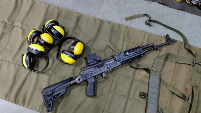 An upgraded AK-47, with earmuffs lying next to it | By special arrangement An upgraded AK-47, with earmuffs lying next to it | By special arrangement