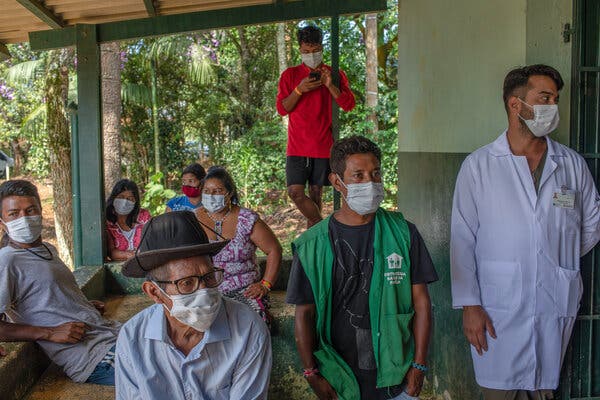 Brazilian indigenous people waiting in São Paulo to receive a coronavirus vaccine from the Chinese company Sinovac. Brazilian officials have complained that Chinese companies have been slow to ship the doses and ingredients.