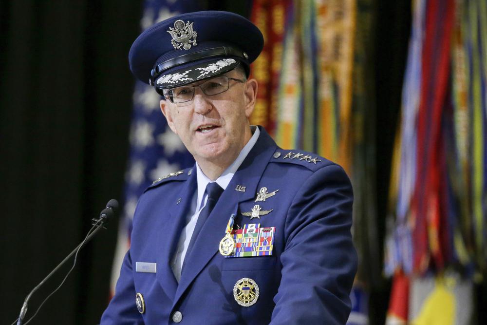 FILE - Air Force Gen. John Hyten, outgoing commander of US Strategic Command, speaks during a change of command ceremony at Offutt AFB in Nebraska, Monday, Nov. 18, 2019. China's growing military muscle and its drive to end America predominance in the Asia-Pacific is rattling the U.S. defense establishment. “The pace at which China is moving is stunning,” says Gen. John Hyten, the No. 2-ranking U.S. military officer, who previously commanded U.S. nuclear forces and oversaw Air Force space operations. (AP Photo/Nati Harnik, File)