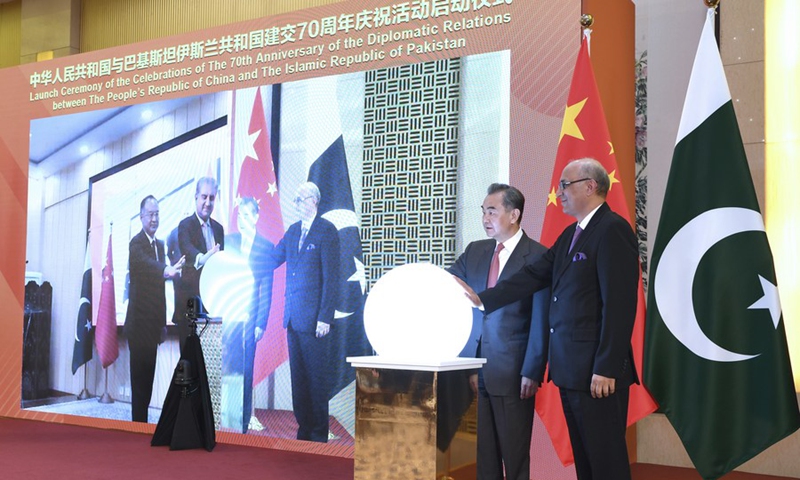 Chinese State Councilor and Foreign Minister Wang Yi attends a virtual ceremony with Pakistani Foreign Minister Shah Mahmood Qureshi to formally commence the celebrations of the 70th anniversary of diplomatic relations between the two countries in Beijing, China, March 2, 2021.(Photo: Xinhua)