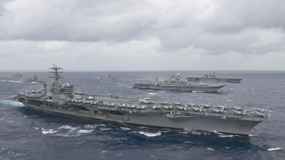 The aircraft carrier USS Nimitz (CVN 68)as it leads a formation of ships from the Indian navy, Japan Maritime Self-Defense Force (JMSDF) and the US Navy in the Bay of Bengal as part of Exercise Malabar 2017. The aircraft carrier USS Nimitz (CVN 68)as it leads a formation of ships from the Indian navy, Japan Maritime Self-Defense Force (JMSDF) and the US Navy in the Bay of Bengal as part of Exercise Malabar 2017.