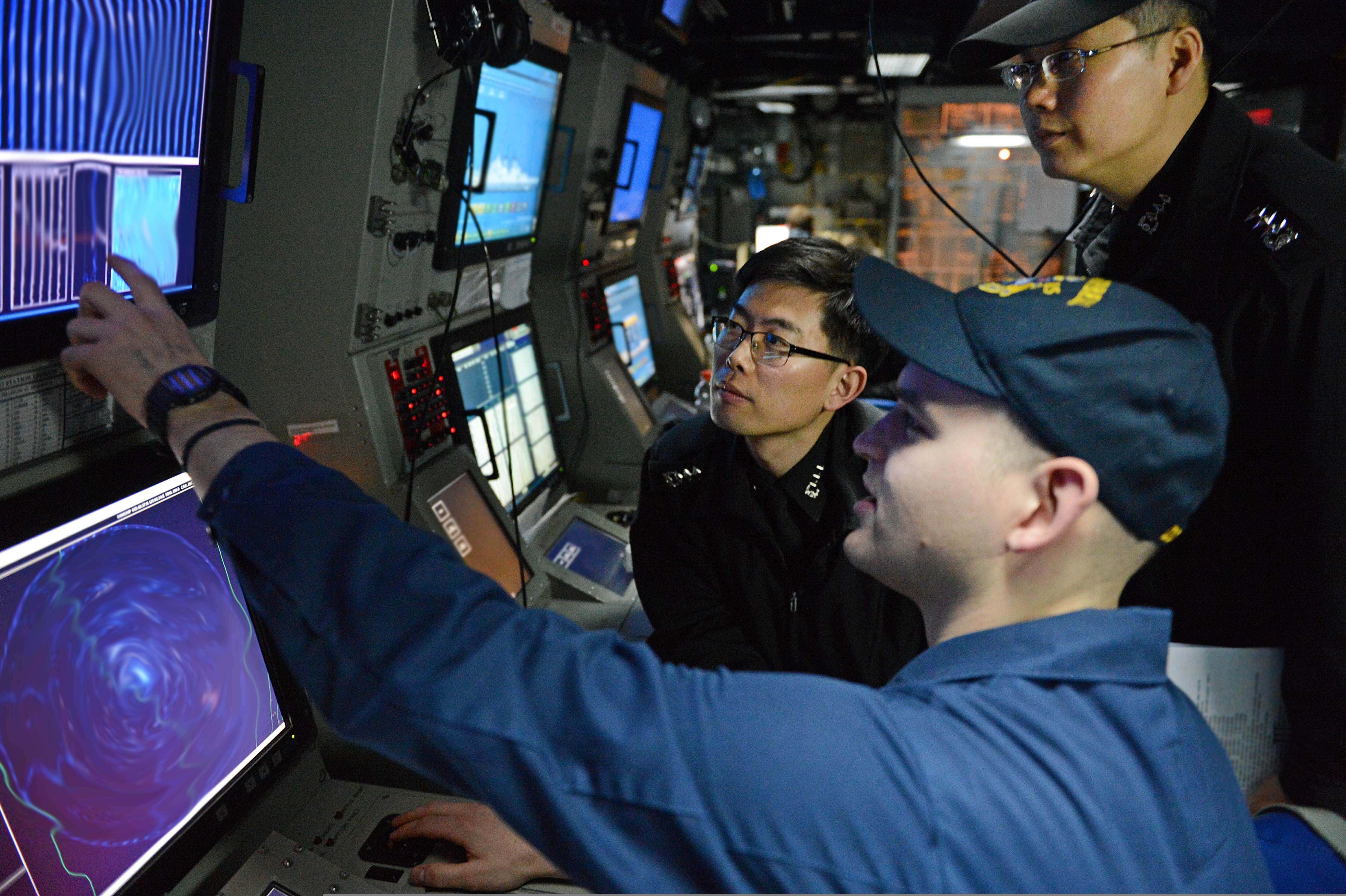 message-editor%2F1601969684110-u.s._navy_sonar_technician_surface_1st_class_andrew_murphy_front_works_with_south_korean_sailors_in_the_sonar_control_room_of_the_guided_missile_destroyer_uss_mccampbell_ddg_85_during_an_antisubmarine_130316-n-tg831-240.jpg